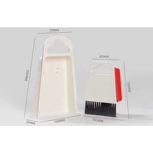 A white table cleaning brush with a red handle and matching dustpan, featuring clear measurements in millimetres.