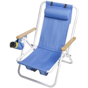 A portable backpack beach chair in vibrant blue with wooden armrests and a side pocket for drink storage.
