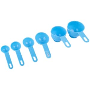 A set of blue plastic measuring cups and spoons, featuring six pieces of varying sizes.