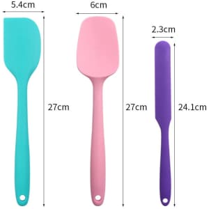 A set of six silicone spatulas in teal, pink, and purple, featuring various sizes and shapes.