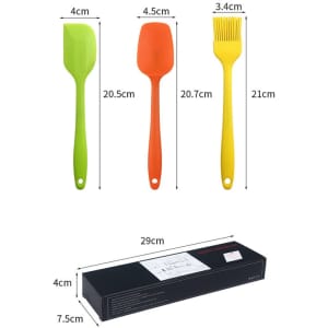 A set of six silicone spatulas in green and orange, packaged in a black box, with various sizes and shapes.