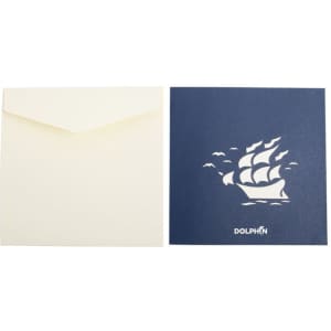 A navy blue greeting card featuring a 3D sailing boat design, paired with a cream envelope.