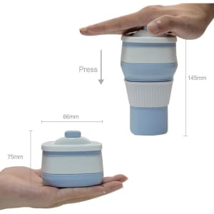 A drink bottle featuring a blue and white silicone design, foldable with a pressed top, held in hands for size comparison.