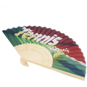 A custom bamboo hand fan featuring shades of green, red, and cream, with decorative details and a logo.
