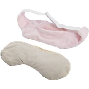A pink flaxseed eye mask with a removable beige lining and an adjustable strap for comfort.
