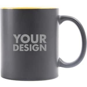 A two-tone ceramic coffee mug with a black exterior and yellow interior, featuring a logo.