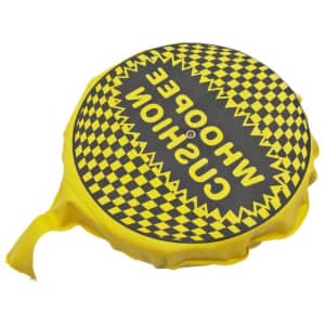 A yellow and black self-inflating whoopee cushion featuring a checkerboard pattern and text.