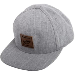 A grey custom snapback hat featuring a textured fabric and a branded patch on the front.