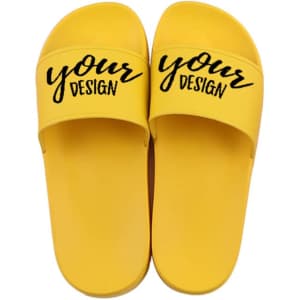 A pair of yellow customised PVC sports slippers featuring a wide strap and a logo.