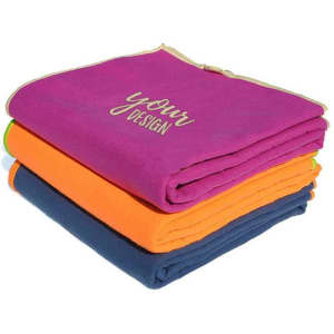 Three microfiber quick dry beach towels stacked together, featuring vibrant pink, orange, and navy colours. Includes a logo.