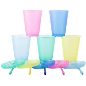 A set of pastel-coloured 16 oz. travel cups with lids and straws, stacked in a playful arrangement.