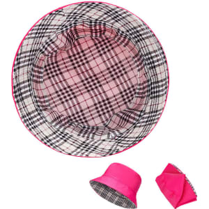 A pink double-sided bucket hat featuring a checkered pattern on one side and solid pink on the other. It has a logo.