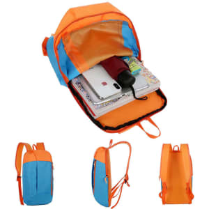 An orange and blue hiking backpack with a spacious interior, containing notebooks and a drink bottle inside.