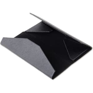 A black foldable glasses case with triangular design and two slots for glasses. It has a simple, sleek finish.