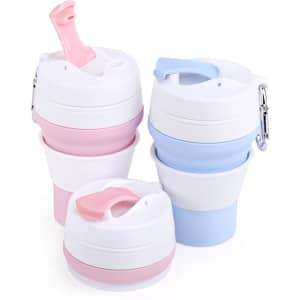 A set of foldable silicone cups in pink and blue, featuring a lid and a carabiner, with a logo on the side.