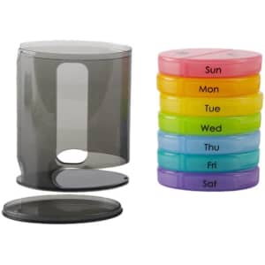 A stackable daily pill organizer in bright colours, including pink, yellow, and blue, with a clear cover.