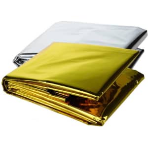 A large outdoor emergency blanket in gold and silver, featuring a shiny, reflective surface. It includes a logo.
