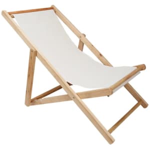 A foldable wooden beach sling chair with a light-coloured fabric seat and a natural wood frame.