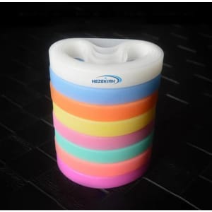 A stack of silicone rubber wristbands in various colours including pink, orange, blue, and green. The item features a logo.