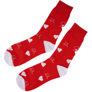 A pair of red custom tube socks featuring white top hats and hearts, with a white sole and toe.