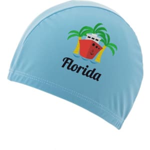 A blue swimming cap for kids featuring a fun design with palm trees and a ship, along with the word "Florida."