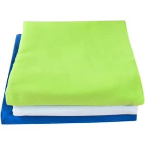 A stack of double-sided fleece beach towels in bright green, blue, and white, featuring a logo.