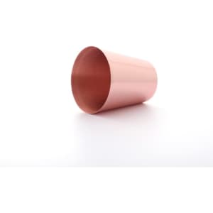 A 2 oz. copper shot glass with a shiny exterior, featuring a smooth, reflective surface.