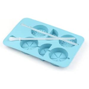 A blue silicone ice cube tray shaped like lemons, featuring six compartments and a stirring stick.