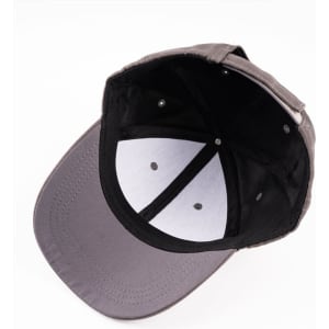 A grey baseball cap viewed from above, featuring a black interior and a logo on the side.