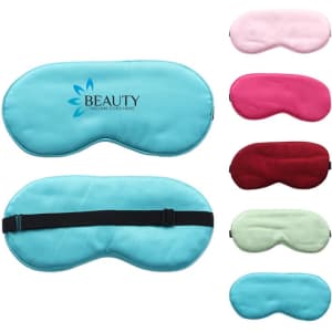 A satin sleep eye mask available in turquoise, pink, red, and green, featuring a logo.