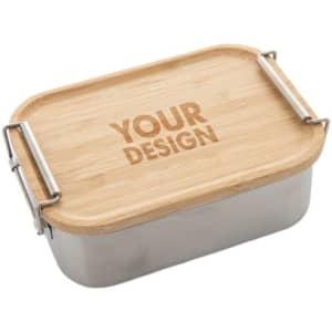A stainless steel lunch box with a bamboo lid and decorative branding, featuring a sleek rectangular design.