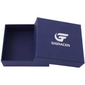 A custom cardboard jewellery gift box in navy blue, featuring a logo on the lid, displayed open.
