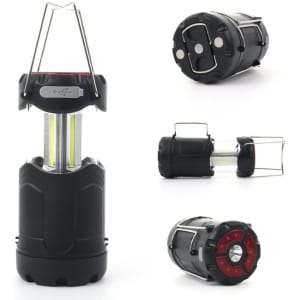 A portable camping light in black with a clear casing and red LED accents, featuring a hanging handle and multiple views.