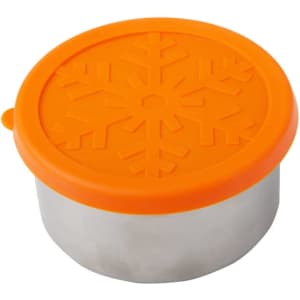 A stainless steel food container with an orange silicone lid featuring a snowflake design.