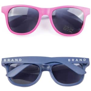 Two pairs of sunglasses: one in bright pink and the other in navy blue, both with dark lenses and branding.