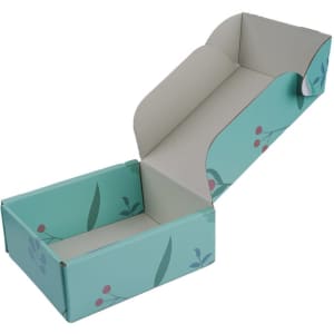 A turquoise personalised shipping paper box with floral designs, open and ready for use.