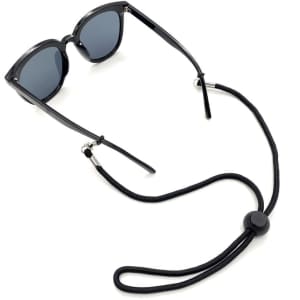 A pair of sunglasses with a black elastic eyeglasses cord, featuring a toggle for adjustment.