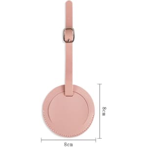 A pink PU leather round luggage tag with a buckle strap, measuring 8 cm in diameter.