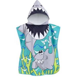 A kids' microfiber hooded towel featuring a shark design, in shades of blue and grey, with a hood at the top.