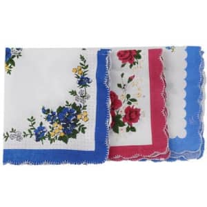 A set of vintage floral cotton handkerchiefs in blue, red, and white with intricate designs and scalloped edges.