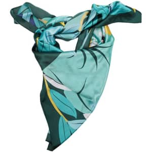 A satin square scarf featuring a colourful leaf design in shades of teal, green, and yellow with a branding logo.