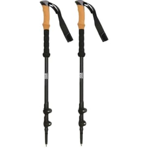A pair of black trekking poles with cork handles and wrist straps.