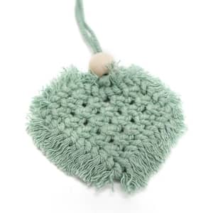 A heart-shaped car hanging ornament in a soft mint green with a textured fringe and a wooden bead.