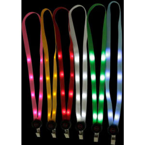 A selection of LED light-up lanyards in pink, yellow, red, white, and green with badge clips.