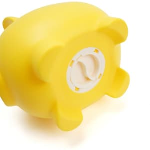 A yellow piggy bank with a round base and four short legs, featuring a logo on the bottom.