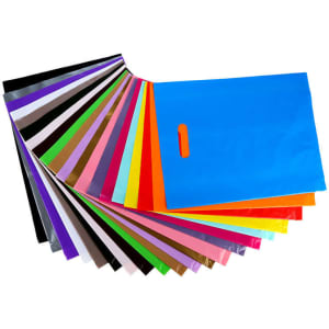 A collection of plastic bags in various colours, featuring a die cut handle and a mix of vibrant and neutral shades.