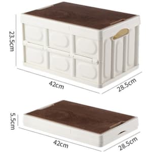 Collapsible storage bin in white with a brown wood lid, featuring handles for easy transport. Dimensions provided.