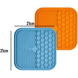 A blue and orange silicone lick mat set, featuring hexagonal designs, each measuring 21cm by 21cm.