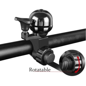 A retro mountain bike bell in silver and black, featuring a rotatable lever for sound adjustment and a mounting bracket.