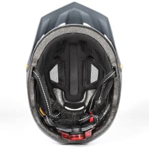 A black bike helmet featuring internal padding and adjustable straps, equipped with a tail light.